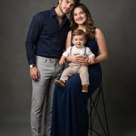 couple-with-baby-in-navy-outfit-studio-portrait-prompt-by-promptplum-2