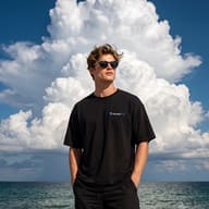 man-black-outfit-beach-large-cloud-portrait-ai-prompt-by-promptplum-1