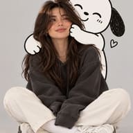 ChatGPT Prompt: Charming studio photography of a cheerful brunette girl in casual streetwear being playfully embraced by a cute doodle dog character.