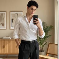 Man in White Shirt Mirror Selfie Portrait AI Photo Editing Prompt. AI generated fashion portrait of a stylish man taking a sunlit mirror selfie in a modern, minimalist living room.