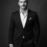 man-in-black-suit-monochrome-studio-portrait-prompt-by-promptplum-1