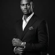 Professional Black and White Portrait AI Photo Editing Prompt. AI generated studio portrait of a dapper Black man in a dark suit adjusting a stainless steel wristwatch against a plain dark background.