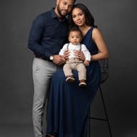 couple-with-baby-in-navy-outfit-studio-portrait-prompt-by-promptplum-1