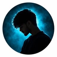 AI Image Prompt: Dark cinematic profile picture of a young man with a beard and textured hair against a glowing blue haze.