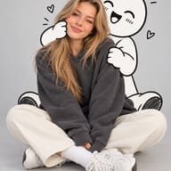 AI Image Prompt: Aesthetic minimalist portrait of a happy girl sitting cross-legged being gently hugged by a hand-drawn cartoon doodle.